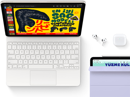 Magic&nbsp;Keyboard&rsquo;a takılı Yıldız&nbsp;Işığı rengi iPad Air&rsquo;in ekranında renkli grafikler, Airpods Pro ve Apple&nbsp;Pencil Pro aksesuarları