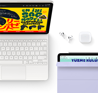 Magic&nbsp;Keyboard&rsquo;a takılı Yıldız&nbsp;Işığı rengi iPad Air&rsquo;in ekranında renkli grafikler, Airpods Pro ve Apple&nbsp;Pencil Pro aksesuarları