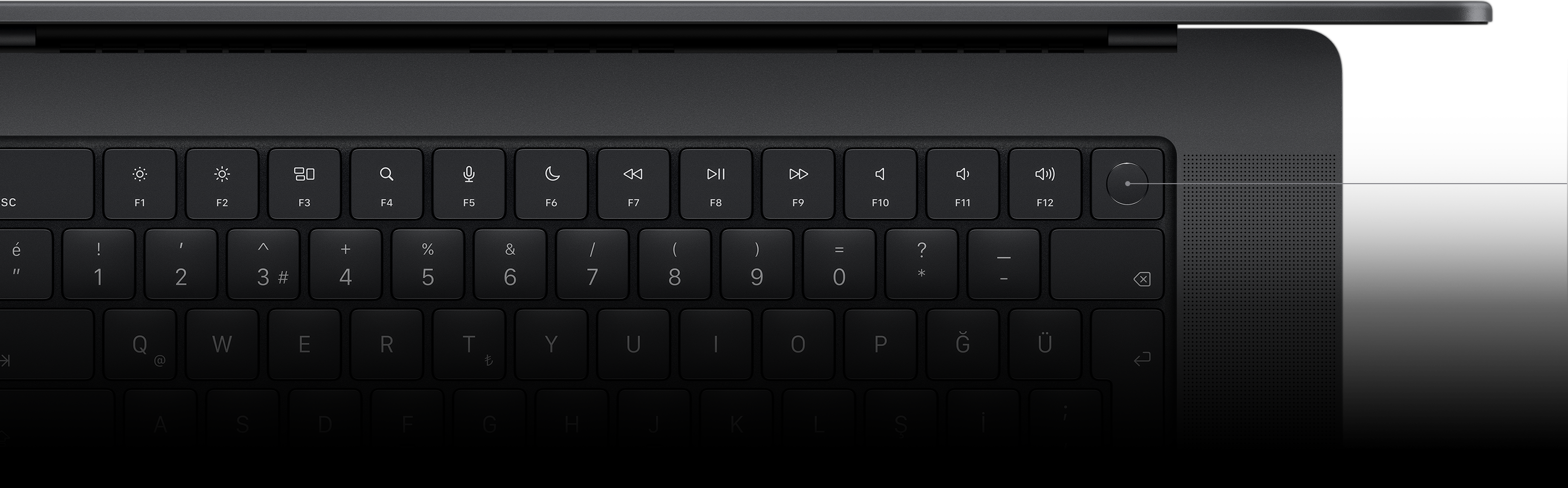 Magic Keyboard üzerindeki Touch ID tuşunu gösteren imleç