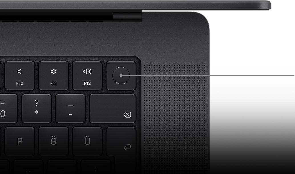 Magic Keyboard üzerindeki Touch ID tuşunu gösteren imleç.