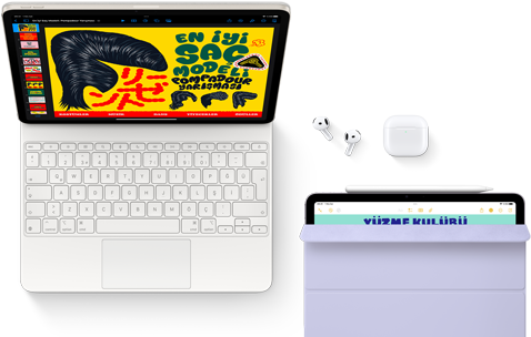 Magic&nbsp;Keyboard&rsquo;a takılı iPad Air, Airpods Pro, Apple&nbsp;Pencil Pro ve Smart Folio aksesuarlarıyla